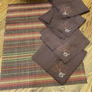 Unbranded fall inspired wooden placemats and napkins. Set of 4